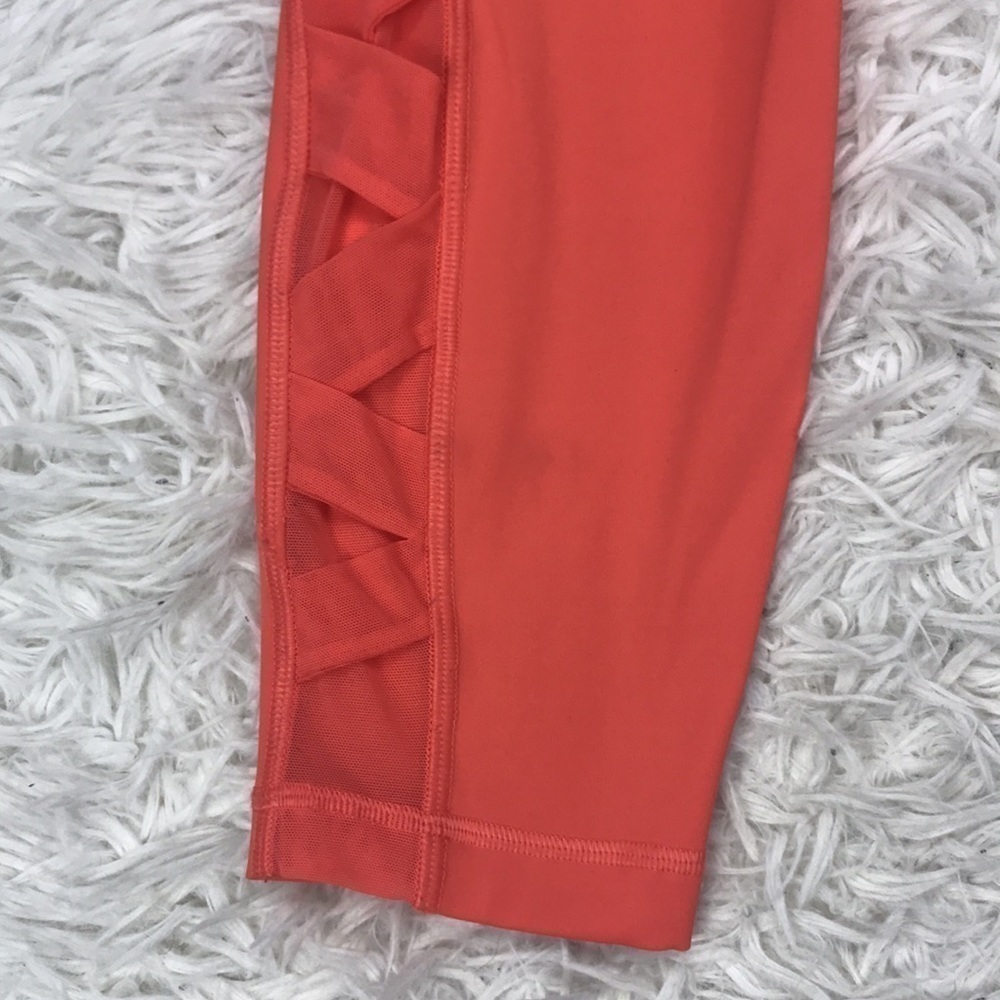 Lululemon Rise & Flow Tights Bright Orange - Picture 2 of 9